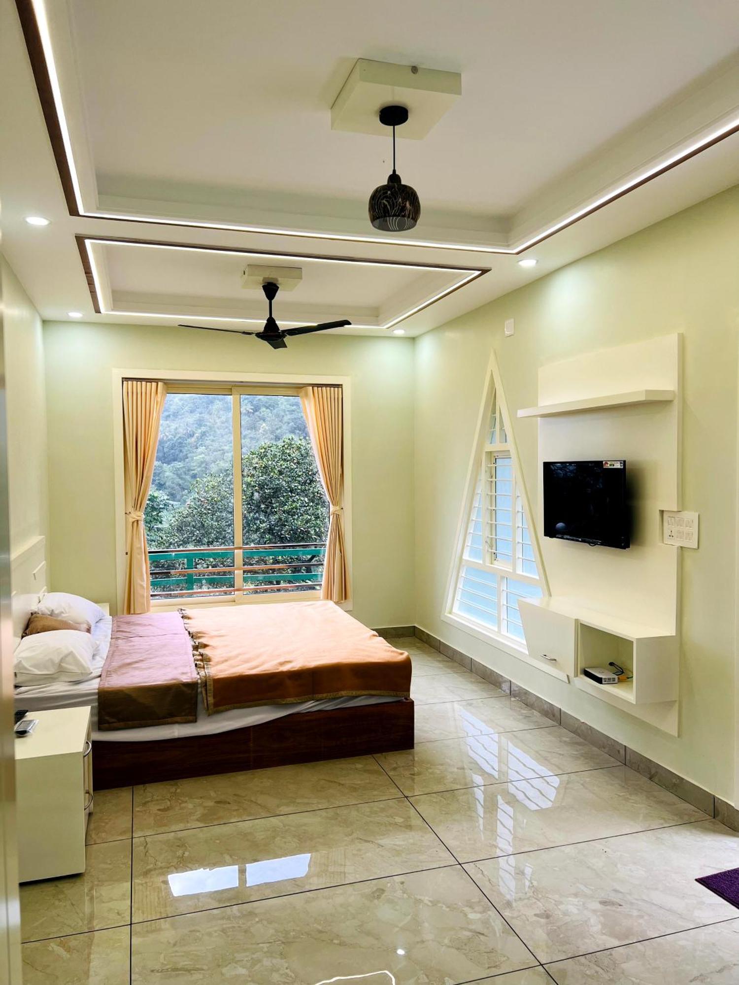 Royal Mount Inn Resorts Paithalmala Oda fotoğraf